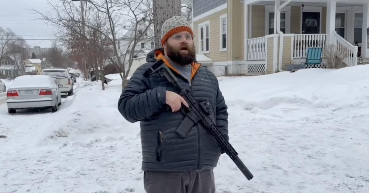 Armed Leftist Stands with Rifle to Block ICE